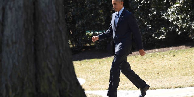 President Obama walks towards Marine One on the South Lawn of the White House, on March 12, 2015.