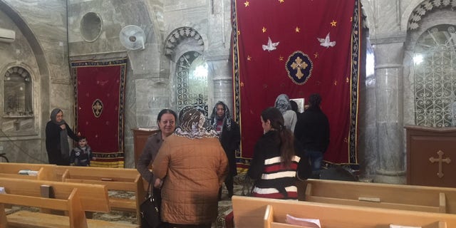Inside St. George Cathedral, fewer and fewer parishioners attend Mass.