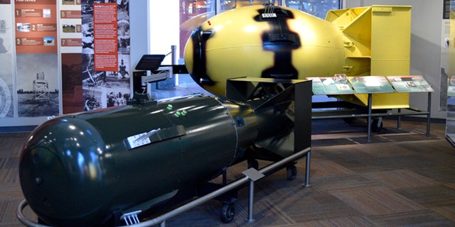 This July 13, 2015 photo shows replicas of atomic bombs "Little Boy," left, and "Fatman," both dropped on Japan during World War II, sit at the Bradbury Science Museum in Los Alamos, N.M. Thursday, July 16, marks the 70th anniversary of the Trinity Test in southern New Mexico and comes amid renewed interest in the Manhattan Project thanks to new books, video oral histories and a WGN America television drama series. (AP Photo/Russell Contreras)