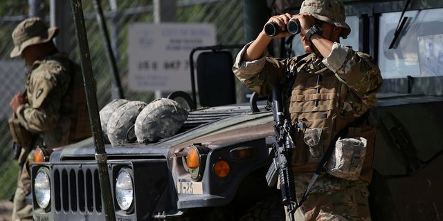 Members of the Texas National Guard patrol the Mexico-US border in April. The National Border Patrol Union called Trump's deployment to the border this year a 'waste,' despite earlier supporting the move.
