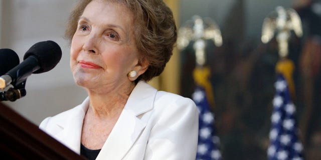 Former first lady Nancy Reagan speaks in the Capitol Rotunda in Washington, during a ceremony to unveil a statue of President Ronald Reagan on June 3, 2009. (AP Photo/Alex Brandon, File)