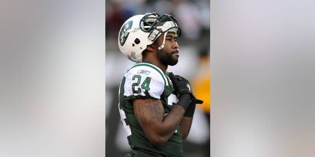 File-This Dec. 24, 2011 file photo shows New York Jets' Darrelle Revis before an NFL football game between the New York Giants and the New York Jets, in East Rutherford, N.J. The Jets have traded Revis to the Buccaneers for this year's No. 13 overall draft pick and another selection next year. (AP Photo/Bill Kostroun, File)