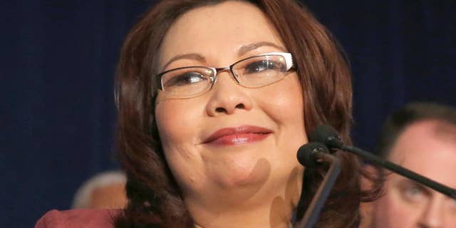 Then-Sen.-elect Tammy Duckworth, D-Ill., smiles as she celebrates her election victory in Chicago, Nov. 8, 2016.
