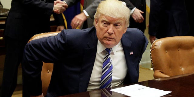 June 6: U.S. President Donald Trump takes his seat during a meeting with Republican Congressional leaders at the White House