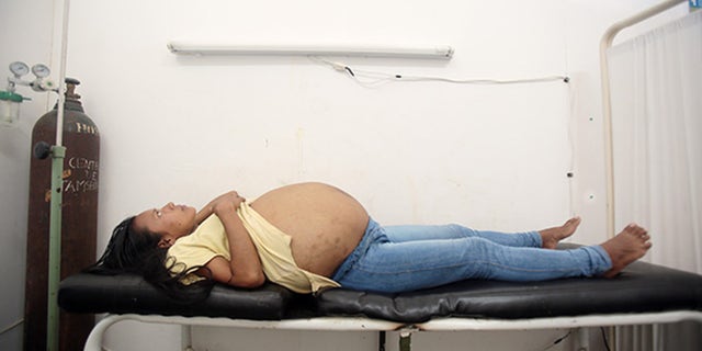 Rojas, before undergoing surgery to remove the tumor