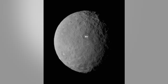 The brightest spot on Ceres possesses a dimmer companion, which apparently lies in the same basin.
