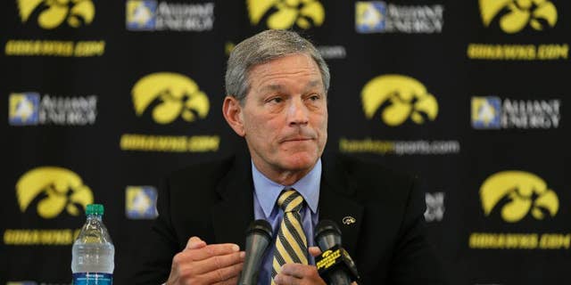 Iowa head coach Kirk Ferentz speaks to the media during Iowa's annual college football media day, Monday, Aug. 4, 2014, in Iowa City, Iowa. (AP Photo/Charlie Neibergall)