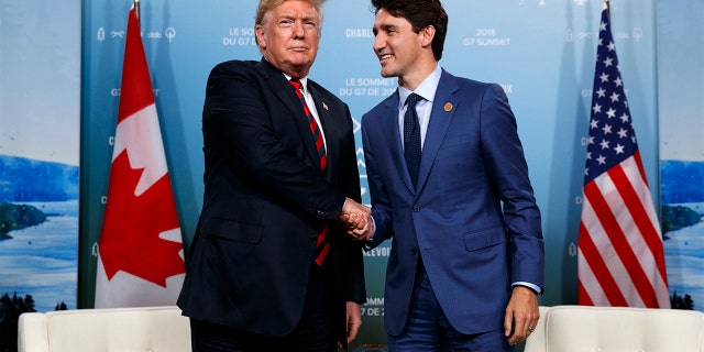 President Donald Trump meets with Canadian Prime Minister Justin Trudeau during the G-7 summit on Friday in Charlevoix, Canada.