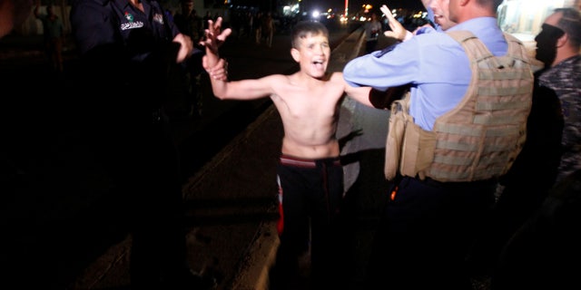 Iraqi security detains teenage suicide bomber