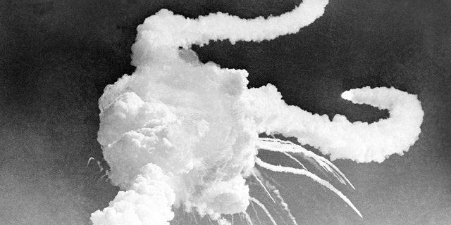 FILE - In this Jan. 28, 1986 file photo the space shuttle Challenger is destroyed by an explosion shortly after it lifted off from Kennedy Space Center, Fla. (AP Photo/Steve Helber, File)