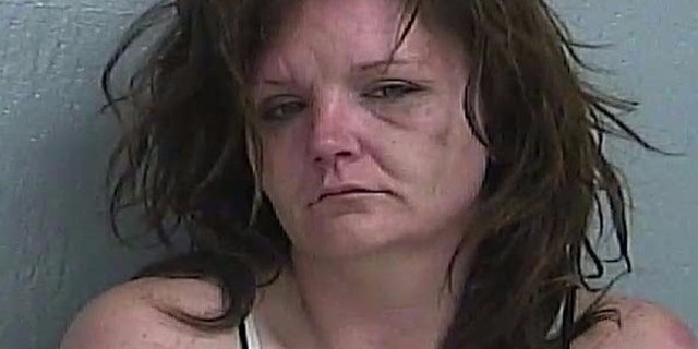 An Illinois woman was arrested last week after police say she climbed into the ceiling of a Big Lots store early Thursday and came crashing down.