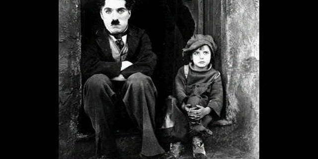 Charlie Chaplin and Jackie Coogan in "The Kid."