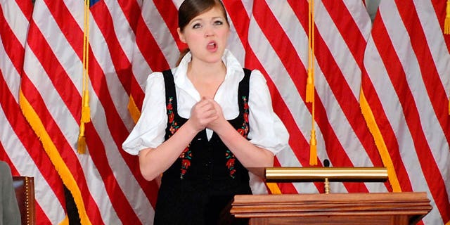 Charity Tillemann-Dick sings during a memorial service for her grandfather, late US Rep. Tom Lantos (D-CA), at the US Capitol in Washington, February 14, 2008.