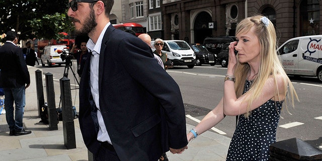 The parents of Charlie Gard, Connie Yates and Chris Gard, as they arrive at the High Court in London for Monday's hearing