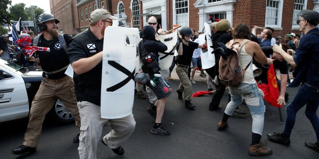 White nationalist members clashed with a group of counter-protesters in Charlottesville, Virginia, on Aug. 12, 2017.