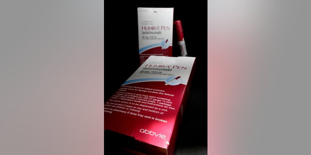 FILE - This Friday, July 18, 2014, file photo, shows AbbVie's signature drug Humira, in Houston. Humira, the second-biggest selling drug in the world, could soon get some cheaper competition in the U.S., after a federal panel, on Tuesday, July 12, 2016, endorsed an alternative version of the pricey injectable medication used to treat various inflammatory diseases. (AP Photo/David J. Phillip, File)