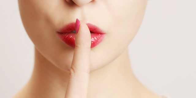 cheating unfaithful woman istock medium
