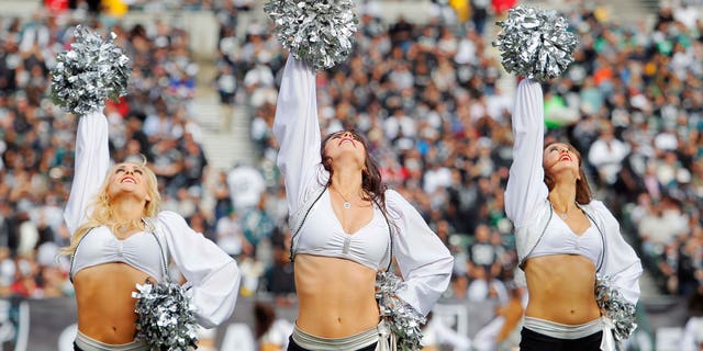 OAKLAND, CA - NOVEMBER 03: Raiderettes dance during a game between the Oakland Raiders and the Philadelphia Eagles on November 3, 2013 at O.co Coliseum in Oakland, California. The Eagles won 49-20. (Photo by Brian Bahr/Getty Images)