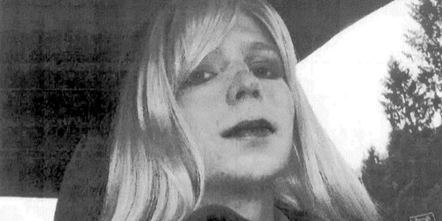 FILE - In this undated file photo provided by the U.S. Army, Pfc. Chelsea Manning poses for a photo wearing a wig and lipstick.
