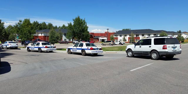 Sept. 14, 2016: Police surround the Heritage Court senior living apartment complex in Cheyenne, Wyo. after a shooting