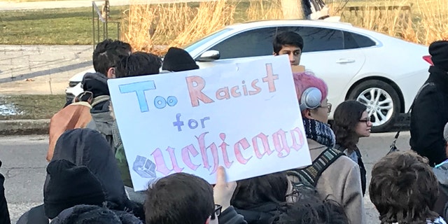 A crowd of protesters gathered in the bitter cold to demand the college rescind Steve Bannon's invitation to speak on campus.