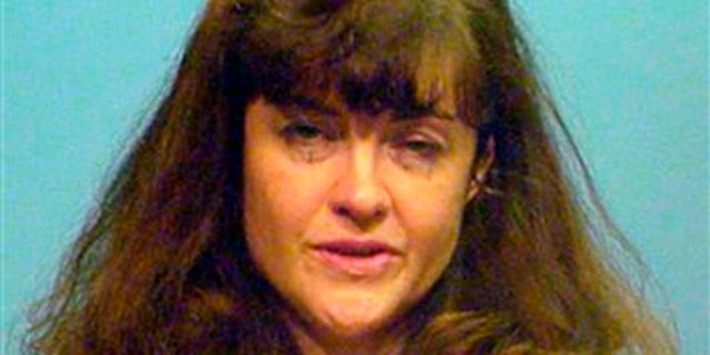 This booking photo provided by the Chicago Police Department shows Kathleen Kearney, 44, of Canton, Mass.