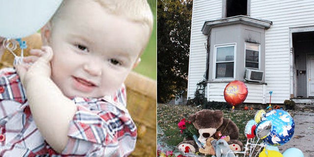 In this Nov. 3, 2013 photo provided by the Louisiana Press-Journal is a memorial in front of a home following a fire in Louisiana, Mo. The family of 3-year-old Riley Miller who was killed in the Oct. 31 fire says it is outraged after police used a stun gun on the boy’s stepfather as he tried to run back in and save the child.