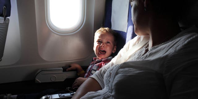 child cries on airplane