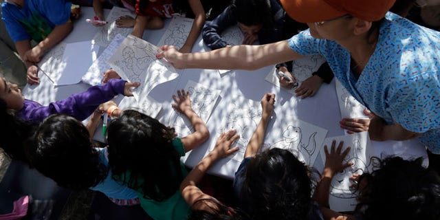 FILE: June 18, 2014: Children detainees at a U.S. Customs and Border Protection processing facility, in Brownsville, Texas.