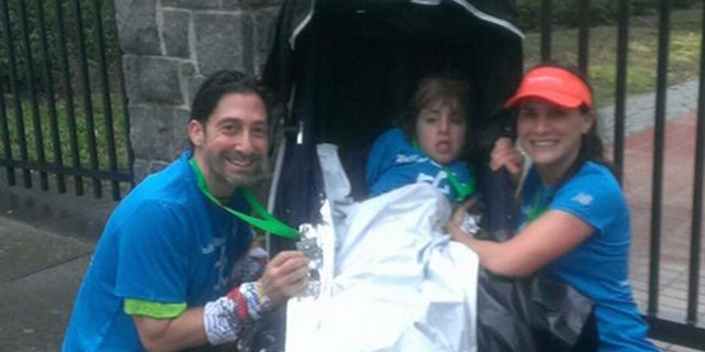 Marjan Holbrook and her daughter Rebecca got a helping hand from nurse Gary Harris.