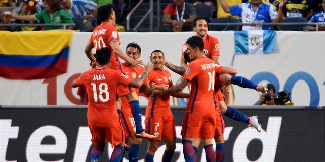CHICAGO, ILLINOIS - JUNE 22: Jose Pedro Fuenzalida #6 of Chile celebrates with his teamamates after scoring his team's second goal during a Semifinal match between Colombia and Chile at Soldier Field as part of Copa America Centenario US 2016 on June 22, 2016 in Chicago, Illinois, US. (Photo by David Banks/LatinContent/Getty Images)