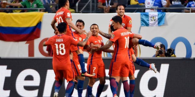 CHICAGO, ILLINOIS - JUNE 22: Jose Pedro Fuenzalida #6 of Chile celebrates with his teamamates after scoring his team's second goal during a Semifinal match between Colombia and Chile at Soldier Field as part of Copa America Centenario US 2016 on June 22, 2016 in Chicago, Illinois, US. (Photo by David Banks/LatinContent/Getty Images)