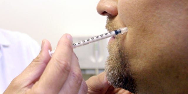 Dr. Marla Ross simulates an injection of Restylane, a gel-based natural substance used for natural enhancement of skin, on patient Craig Sowash, who has had previous facial injections, at her Beaverton, Ore., office Thursday, June 24, 2004. Competition for corporate jobs among the aging baby boom generation, along with quicker, cheaper and less invasive procedures are helping drive an increase in cosmetic surgery, especially for men who are surpassing women in the demand for some techniques.(AP Photo/Don Ryan)