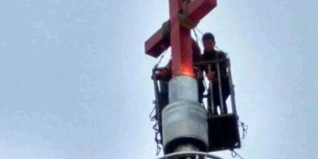 Government officials are forcing thousands of churches to remove crosses, according to advocates.