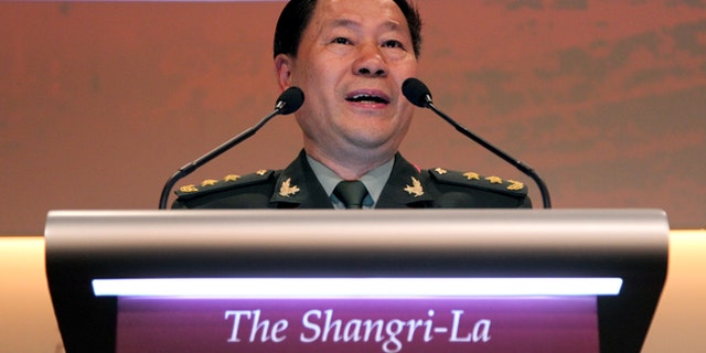 June 2, 2013: China's Lt. Gen. Qi Jianguo, Deputy Chief of General Staff, Peoples Liberation Army, delivers his speech at the International Institute for Strategic Studies Shangri-la Dialogue, or IISS Asia Security Summit in Singapore.