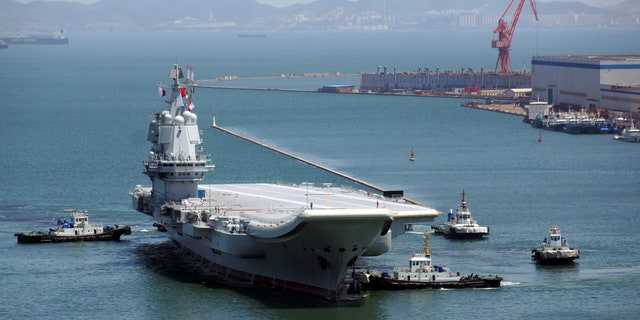China's first domestically developed aircraft carrier is seen at a port on May 18, 2018, in Dalian after completing its first sea trials, in Liaoning province, China May 18, 2018.
