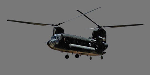 File: A US Army CH-47D Chinook helicopter in flight.