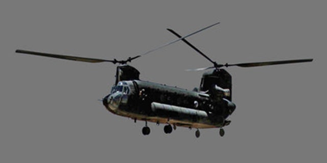 File: A US Army CH-47D Chinook helicopter in flight.