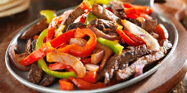 mexican food - beef fajitas and bell peppers