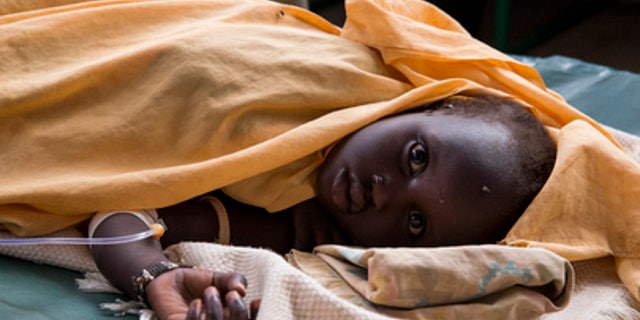 A child is treated for cholera in an isolation ward in Juba, South Sudan, on June 25, 2015. (UN Photo/JC McIlwaine)