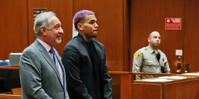 Mark Geragos, left, is seen in this March 2015 photo representing R&amp;B singer Chris Brown at a court hearing in Los Angeles.