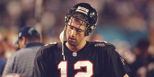 31 Jan 1999: Quarterback Chris Chandler #12 of the Atlanta Falcons catches his breath during Superbowl XXXIII against the Denver Broncos at the Pro Player Stadium in Miami, Florida. The Broncos defeated the Falcons 34-19. Mandatory Credit: Andy Lyons/Allsport