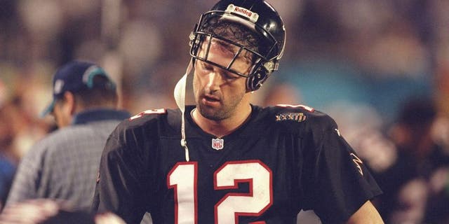 31 Jan 1999: Quarterback Chris Chandler #12 of the Atlanta Falcons catches his breath during Superbowl XXXIII against the Denver Broncos at the Pro Player Stadium in Miami, Florida. The Broncos defeated the Falcons 34-19. Mandatory Credit: Andy Lyons/Allsport
