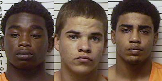 This combination file photo made with booking photos provided by the Stephens County, Okla., Sheriffs Department, shows, from left, James Francis Edwards Jr., 15, Michael Dewayne Jones, 17, and Chancey Allen Luna, 16, all of Duncan, Okla. The three teenagers have been charged in connection with the killing of 22-year-old Australian collegiate baseball player Christopher Lane, 22.