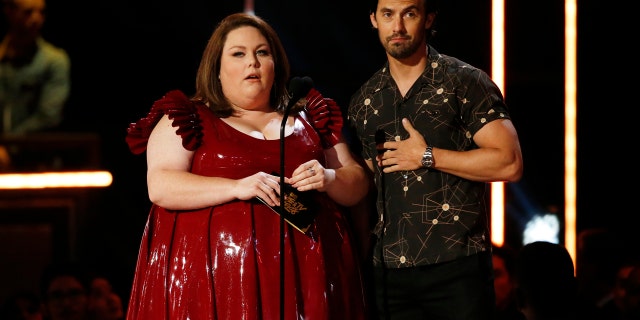 Chrissy Metz and Milo Ventimiglia present an award at the 2017 MTV Movie and TV Awards.