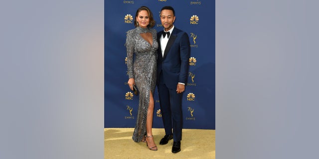 Chrissy Teigen and John Legend attended the 70th annual Emmy awards where the model was caught making one of her infamous famous on camera yet again.