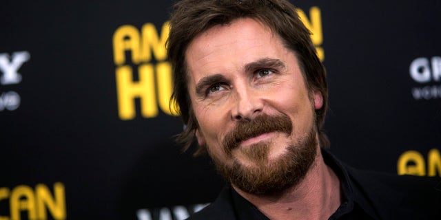 Actor Christian Bale attends the 'American Hustle' premiere in New York December 8, 2013. REUTERS/Eric Thayer (UNITED STATES - Tags: ENTERTAINMENT HEADSHOT) - RTX16AGH