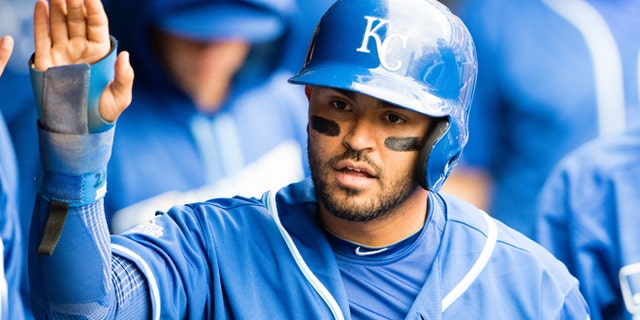 CLEVELAND, OH - MAY 7: Christian Colon #24 of the Kansas City Royals celebrates after scoring during the fifth inning against the Cleveland Indians at Progressive Field on May 7, 2016 in Cleveland, Ohio. (Photo by Jason Miller/Getty Images)