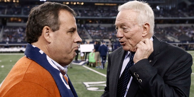 Dec. 21, 2014: New Jersey Gov. Chris Christie, left, talks with Dallas Cowboys team owner Jerry Jones, right, on the field as the teams warm up before an NFL football game against the Indianapolis Colts