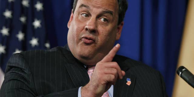 New Jersey Gov. Chris Christie addresses the media Thursday, May 26, 2011 in Trenton, N.J. on global warming. (AP Photo/Mel Evans)